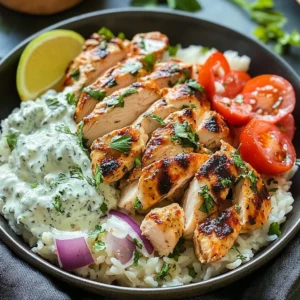 Dump-and-bake chicken tzatziki with rice in a serving dish.