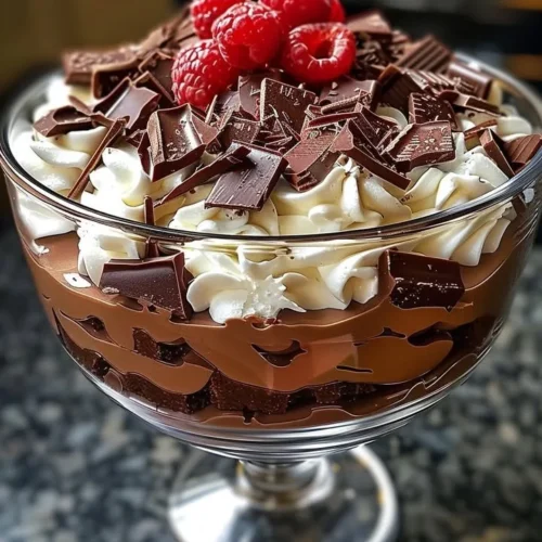 Baileys Chocolate Cheesecake Trifle layered with rich chocolate and creamy cheesecake.