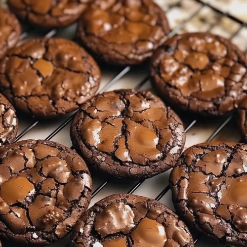 Homemade chewy fudgy chocolate cookies on a baking tray