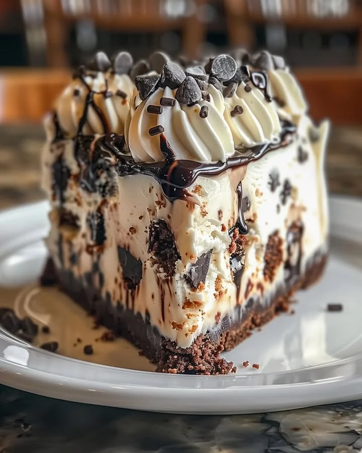 Chocolate Chip Cookie Dough Ice Cream Cake topped with cookie dough chunks