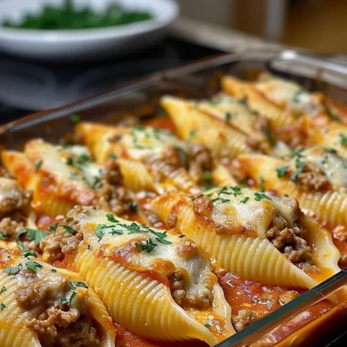 Creamy ricotta beef stuffed shells pasta served on a plate