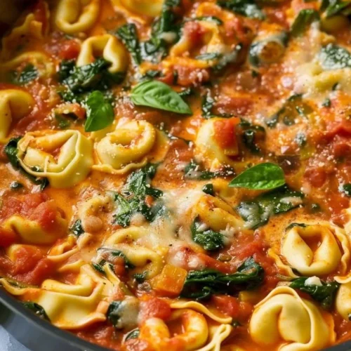 Creamy Tomato Basil Tortellini Skillet with fresh basil and tomatoes