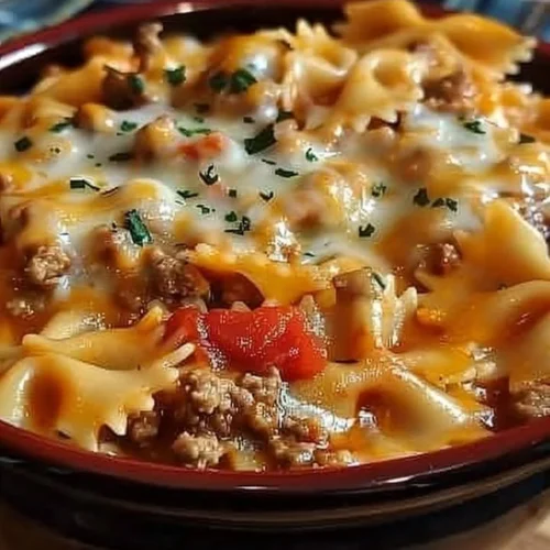 Creamy Velveeta and ground beef bowtie pasta in a bowl
