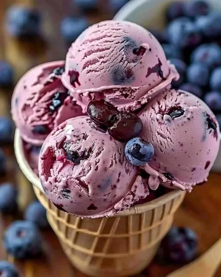Crimson Choco Rhapsody Ice Cream in a bowl topped with chocolate shavings