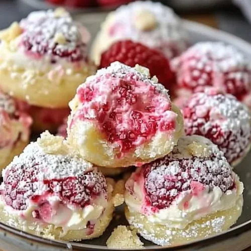 Delicious raspberry cream cheese bites topped with fresh raspberries