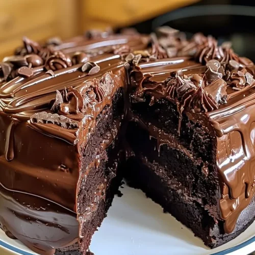 Delicious double chocolate Coca-Cola cake slice on a plate
