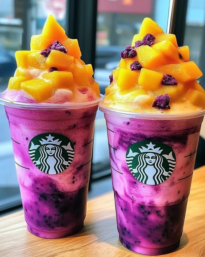Dragon Fruit Mango Sunset Flushies Frappuccino served in a vibrant glass