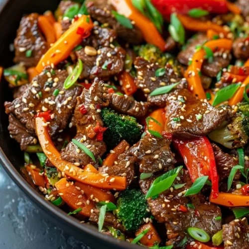 Delicious beef stir fry with colorful vegetables and savory sauce.
