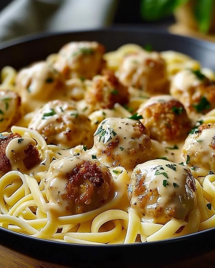 Delicious Garlic Butter Chicken Bites served with creamy Parmesan pasta
