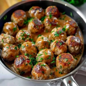 Delicious Swedish meatballs in creamy sauce served on a plate