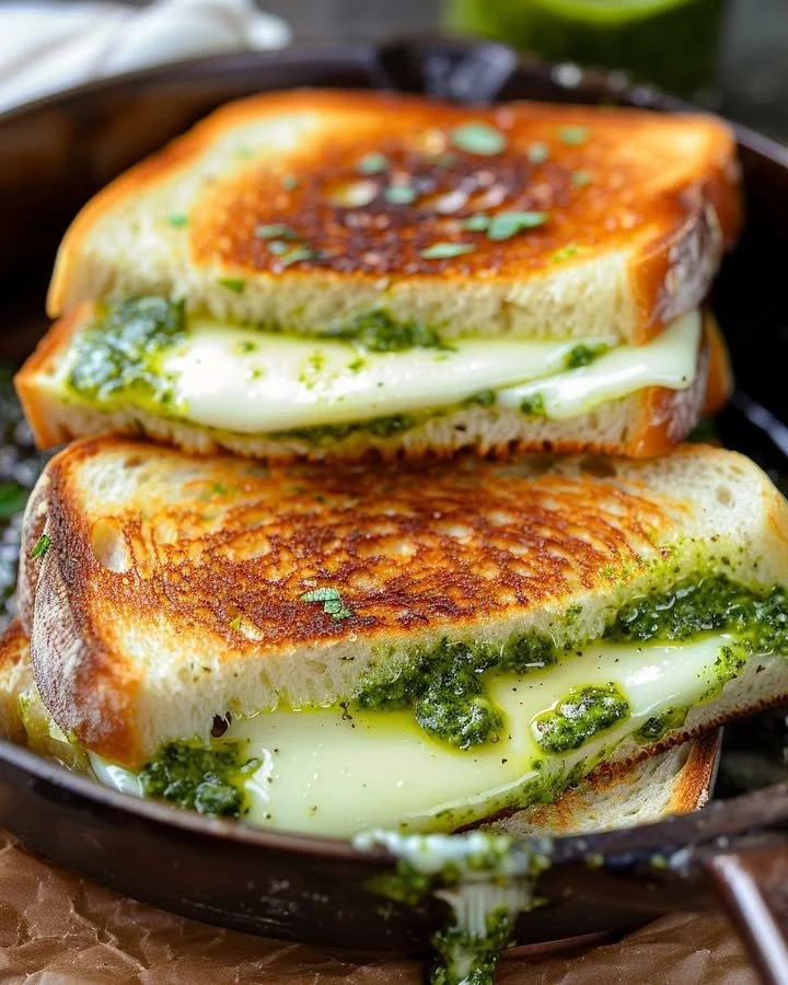 Pesto Grilled Cheese sandwich with melted cheese and fresh pesto
