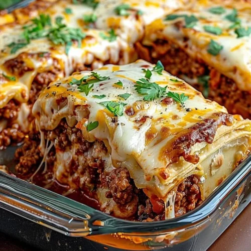 Pillsbury Crescent Roll Taco Bake fresh out of the oven, garnished and served.