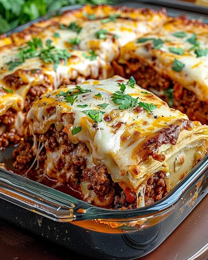 Pillsbury Crescent Roll Taco Bake fresh out of the oven, garnished and served.