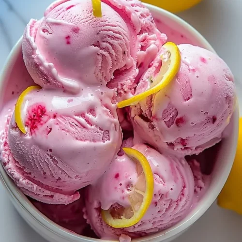 Delicious pink lemonade ice cream served in a bowl