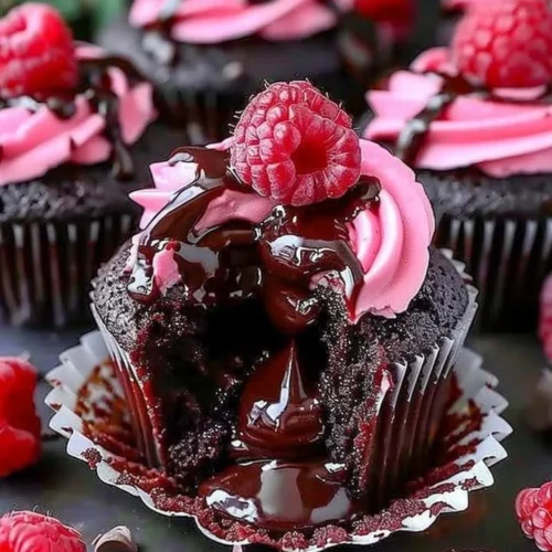 Delectable Raspberry Chocolate Lava Cupcakes with rich chocolate sauce