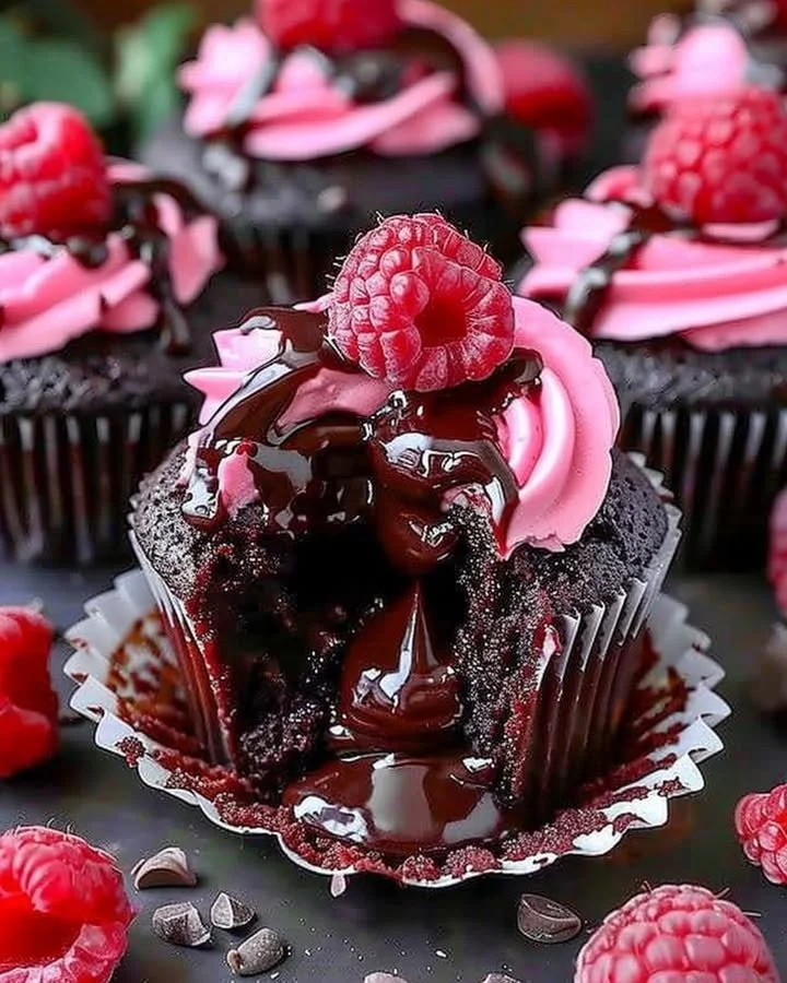 Delectable Raspberry Chocolate Lava Cupcakes with rich chocolate sauce