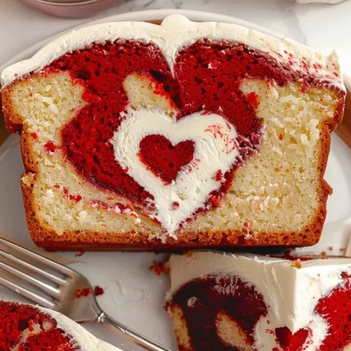 Delicious Red Velvet Loaf Cake topped with cream cheese frosting