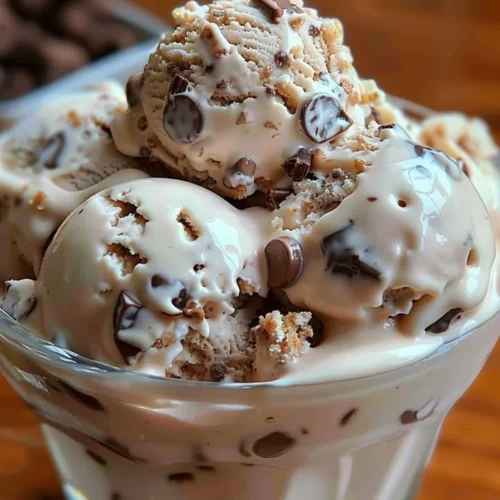 Delicious bowl of Rocky Road Ice Cream topped with marshmallows and almonds.