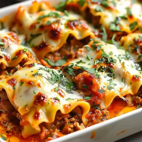 Delicious Short Rib Lasagna Rolls served on a plate