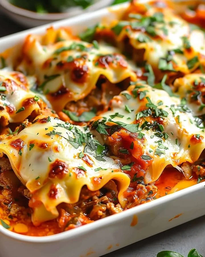 Delicious Short Rib Lasagna Rolls served on a plate