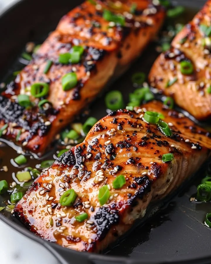 Silken miso-ginger glazed salmon served with vegetables on a plate