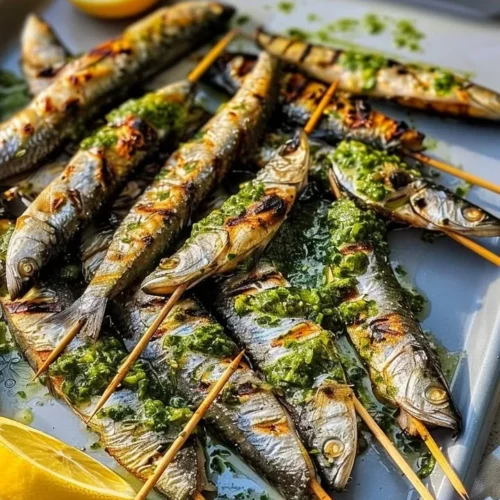 Delicious sizzling sardine skewers grilled to perfection with spices.