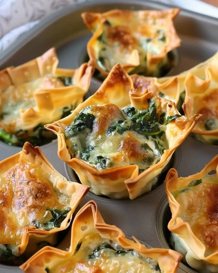 Delicious spinach artichoke wonton cups served as a tasty appetizer